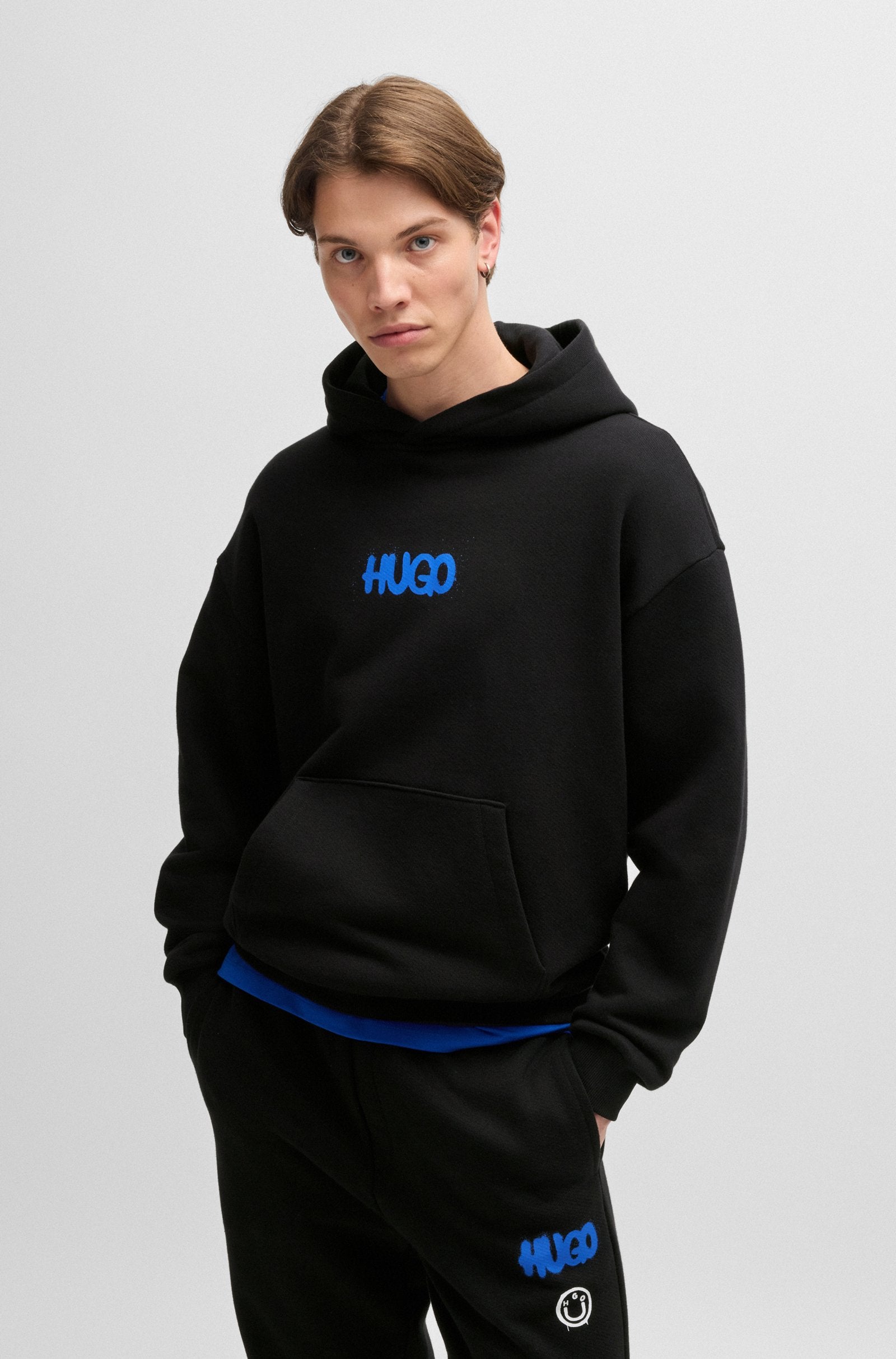 Hugo Blue | Nimayho Hoodie with Smiley Face Logo | 001 black