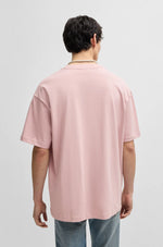 Lade das Bild in den Galerie-Viewer, Hugo Blue | Oversized T-Shirt mit Happy HUGO Logo | 680 light pastel pink

